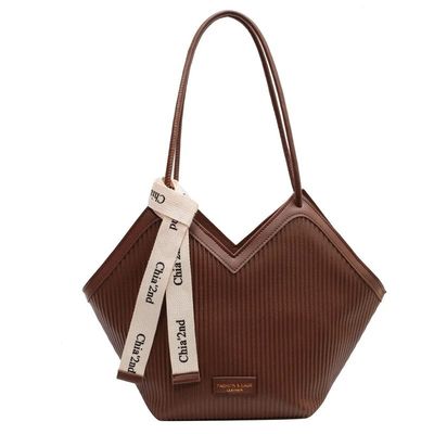 Bolsas con estilo para estudiantes con material de revestimiento de cachemira y decoración de cerradura