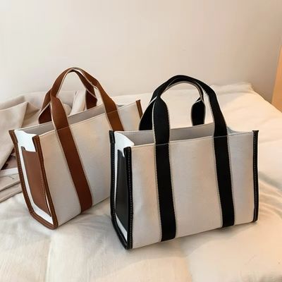 Material principal Bolsos de mano PU GHJ-31 para mujeres con detección de movimiento y diseño a rayas