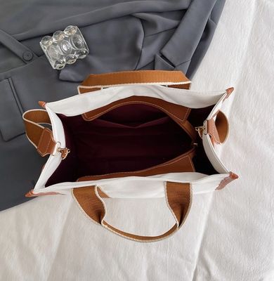 Material principal Bolsos de mano PU GHJ-31 para mujeres con detección de movimiento y diseño a rayas