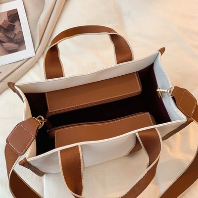 Material principal Bolsos de mano PU GHJ-31 para mujeres con detección de movimiento y diseño a rayas