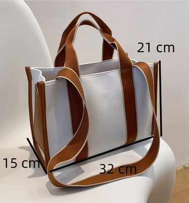 Material principal Bolsos de mano PU GHJ-31 para mujeres con detección de movimiento y diseño a rayas