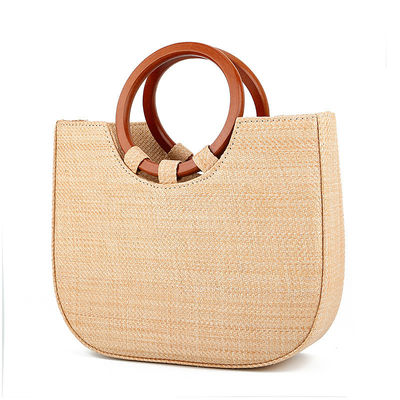 Bolso de mujer tejido con hierba y mango de madera para el ocio con diseños de moda
