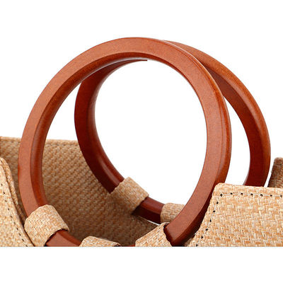 Bolso de mujer tejido con hierba y mango de madera para el ocio con diseños de moda