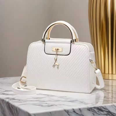 Bolso de mano de moda de cuerpo cruzado de cuero de logotipo personalizado para mujeres con gran capacidad y bajo MOQ