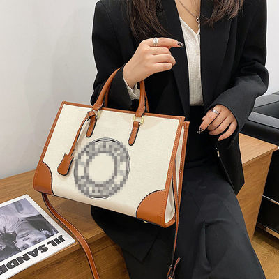 Bolso de tela de hombro único para mujeres con bolso de gran capacidad y cierre con cremallera