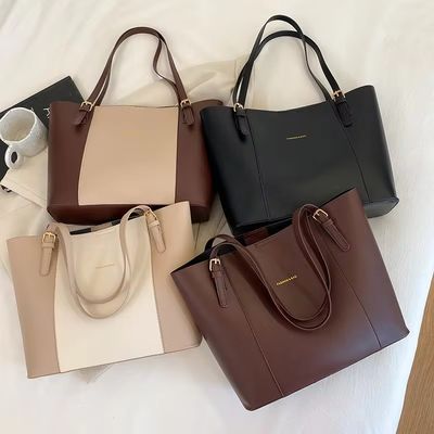 Bolsas de hombro de moda para mujeres con cadena dorada y mango único