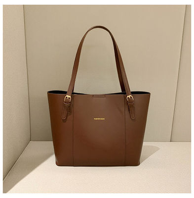 Bolsas de hombro de moda para mujeres con cadena dorada y mango único