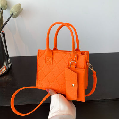 Bolsos de cuero genuino Bolso de bolso de línea de costura popular para entusiastas del fitness