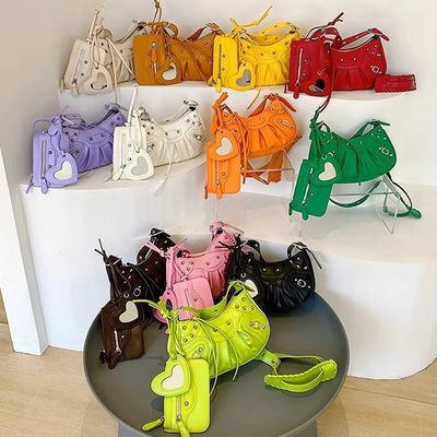 Bolsos de lujo para mujeres Bolsos de diseño con botón magnético de marca