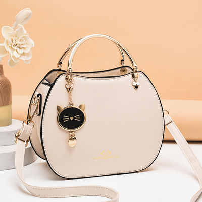 Bolso de moda de hombro único para mujeres con colgante de gato y cierre de cremallera