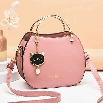 Bolso de moda de hombro único para mujeres con colgante de gato y cierre de cremallera
