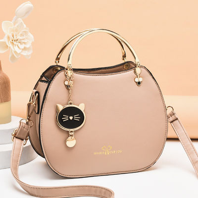 Bolso de moda de hombro único para mujeres con colgante de gato y cierre de cremallera