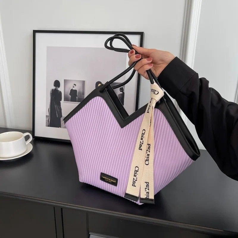 Bolsas con estilo para estudiantes con material de revestimiento de cachemira y decoración de cerradura